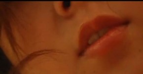 Asian teenager with a beautiful smile in nazhnem underwear is in the bathroom, sznicer