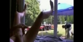 Nude Elay Smith is pulling her pussy in front of the window behind which to be a man, Nynekames