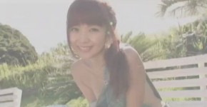Japanese woman in a swimsuit at the beach striptease Fine, Saxell