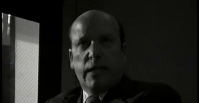 Angry law-enforcement officers watch from behind filming of adult movie with brunette goddes Jewel De`Nyle and longhaired geek, 