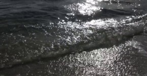 beautiful brunette in a swimsuit photo session near the sea, justlook