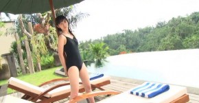A young Japanese woman in a bathing suit near the sea beautiful body striptease Airi Suzuki Cute, greenjetta