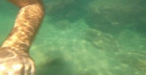 Public masturbation of a beautiful amateur couple on a public beach under the water sea, glyceline