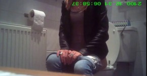 blonde in jeans pissing in public restroom, barmasaa